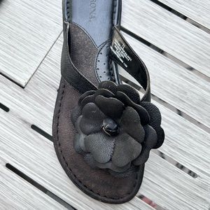 Size 8.5 Black flower sandal. $8.00